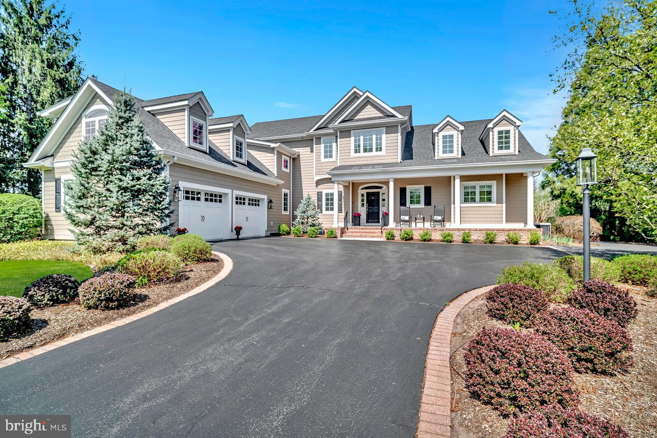 17 Banyan Road Skillman, NJ 08558 - Photo 2 of 53 a front view of a house with a garden and plants