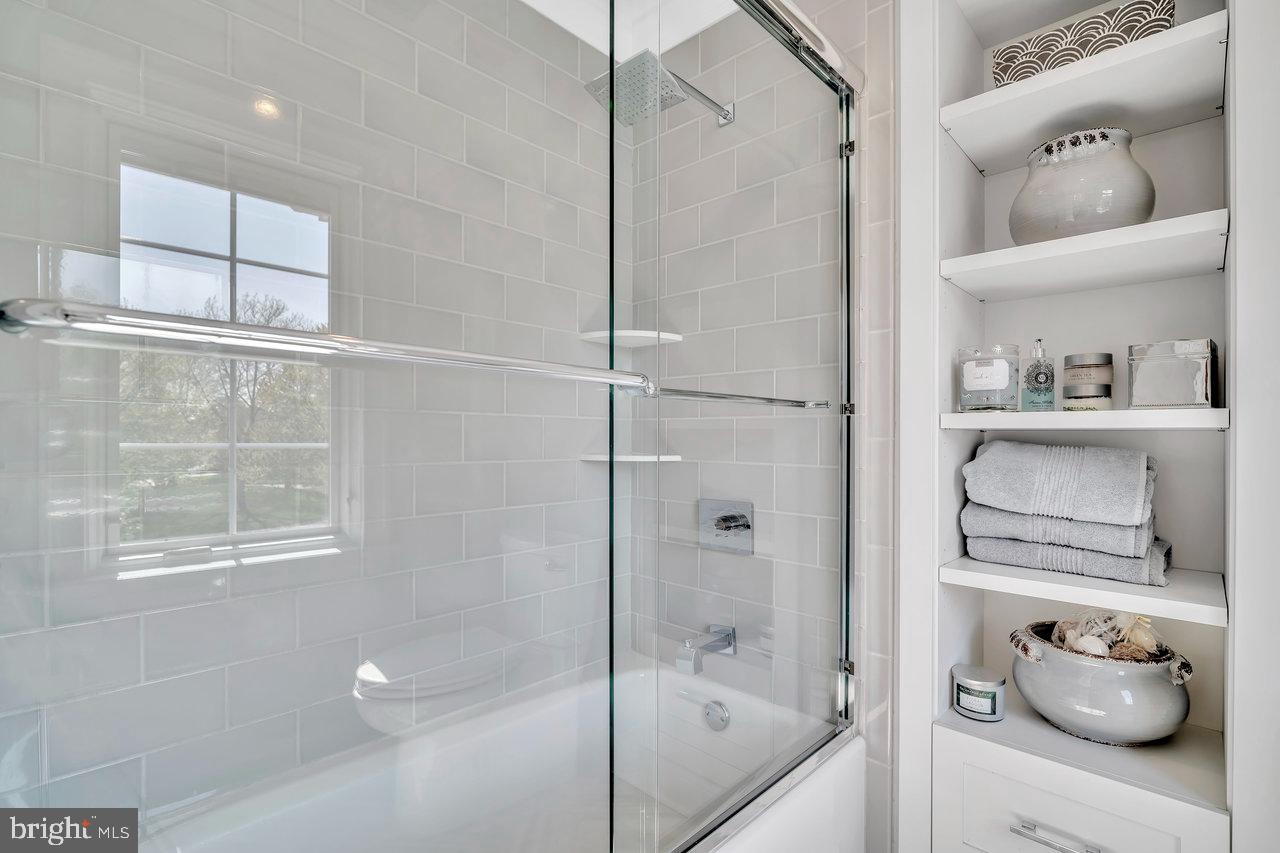 17 Banyan Road Skillman, NJ 08558 - Photo 35 of 53 a bathroom with a tub and shower