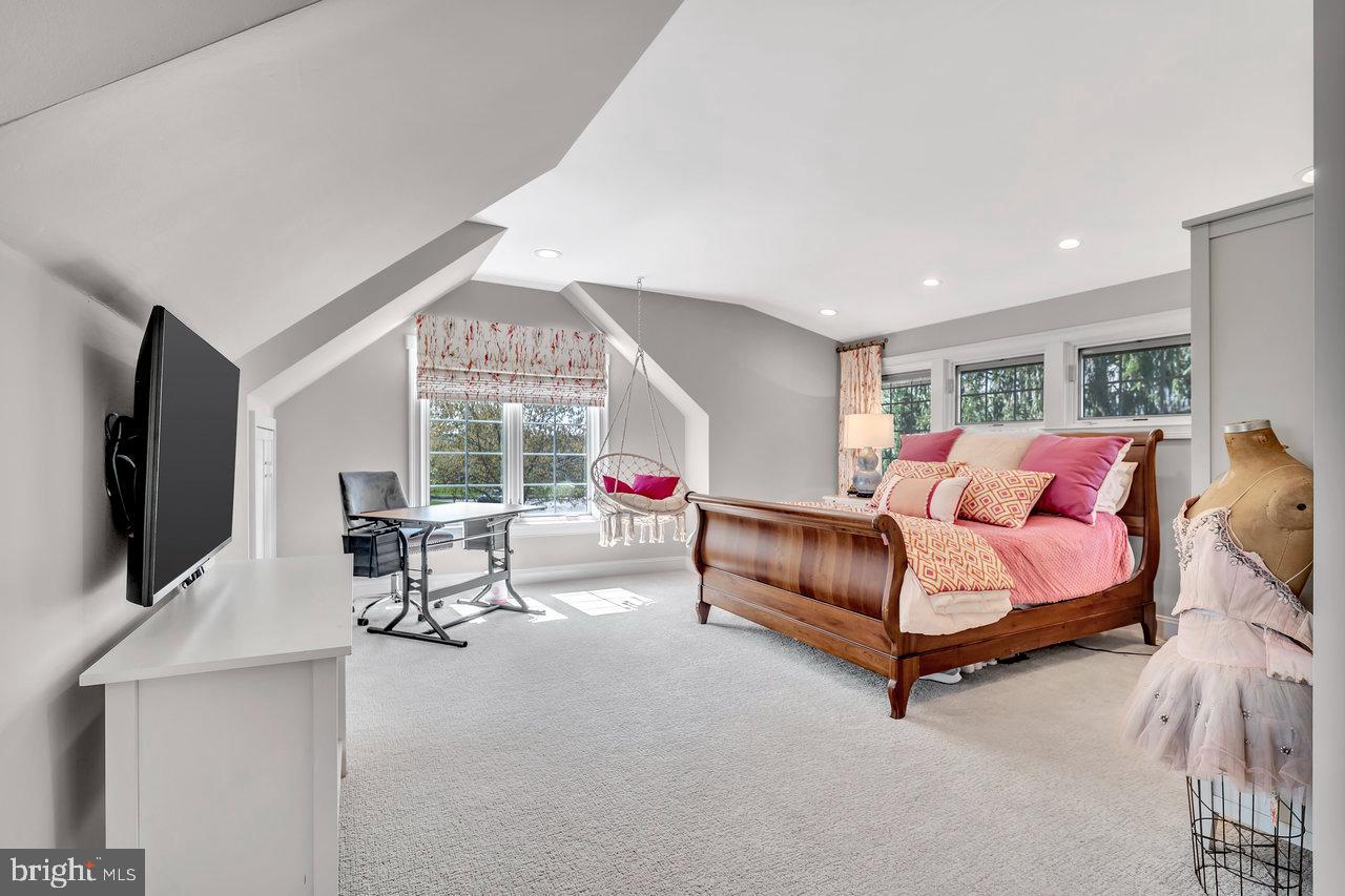 17 Banyan Road Skillman, NJ 08558 - Photo 37 of 53 a bedroom with furniture and a flat screen tv