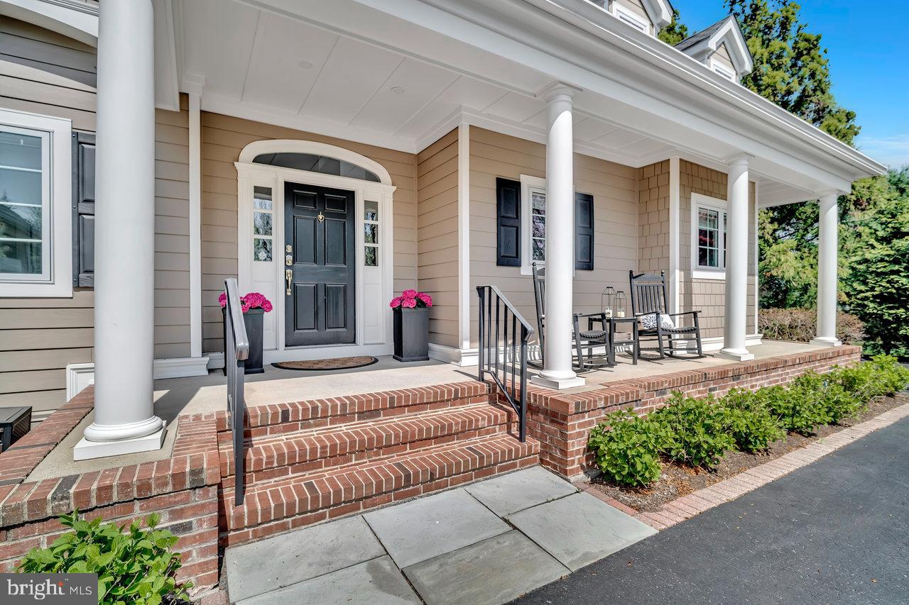 17 Banyan Road Skillman, NJ 08558 - Photo 4 of 53 front view of a house with potted plants