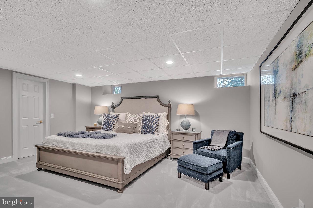 17 Banyan Road Skillman, NJ 08558 - Photo 43 of 53 a bedroom with a bed and a couch