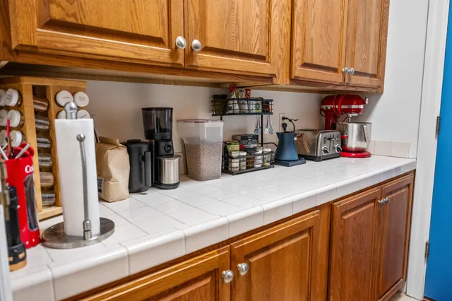 a kitchen with a sink and cabinets