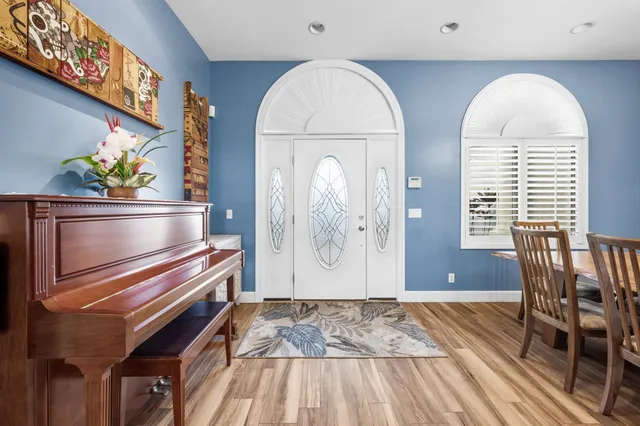 a view of dining room and wooden floor