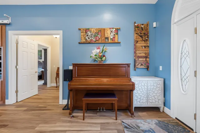 a view of livingroom with furniture and wooden floor