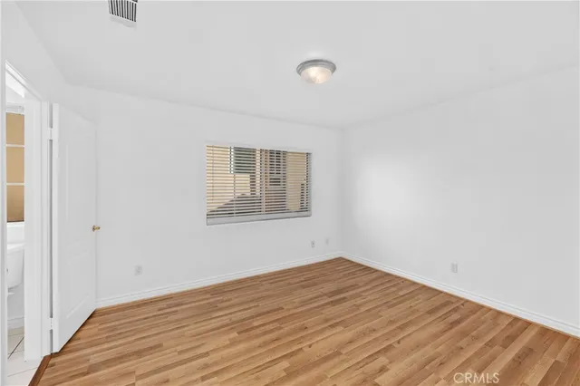 a kitchen with a refrigerator stove and microwave