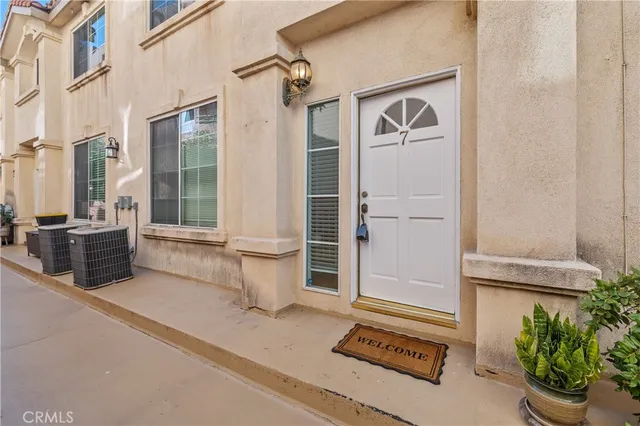 a front view of a house with a garage