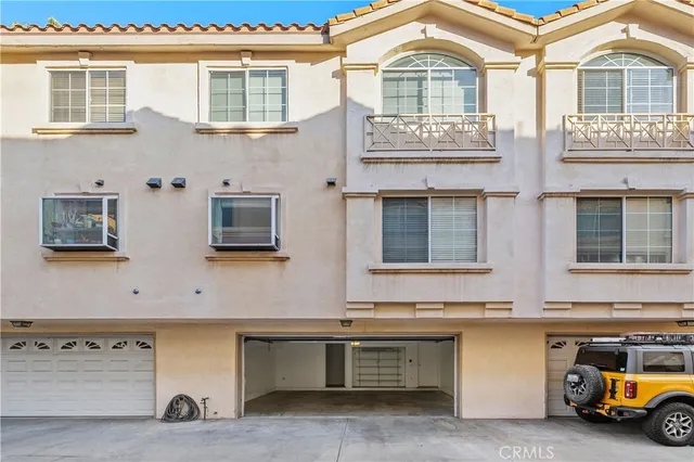 a front view of a building with glass windows