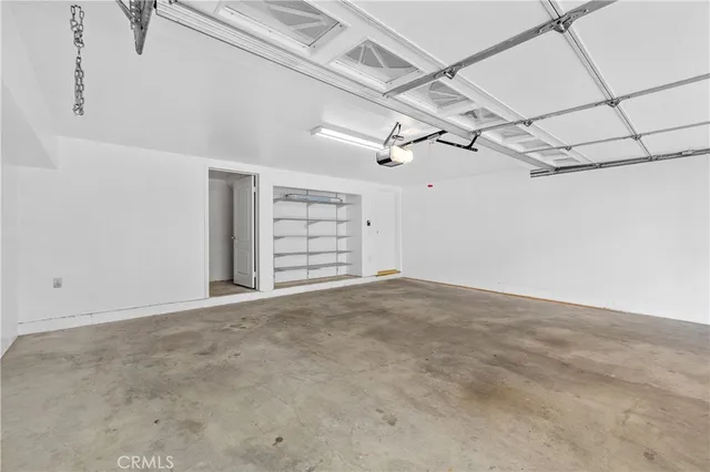 a view of a room with a garage