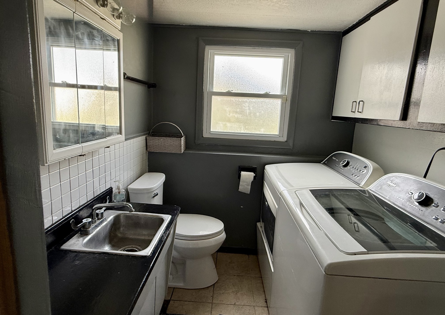 5653 Dover Road Oak Forest, IL 60452 - Photo 11 of 17 a bathroom with a toilet sink and mirror
