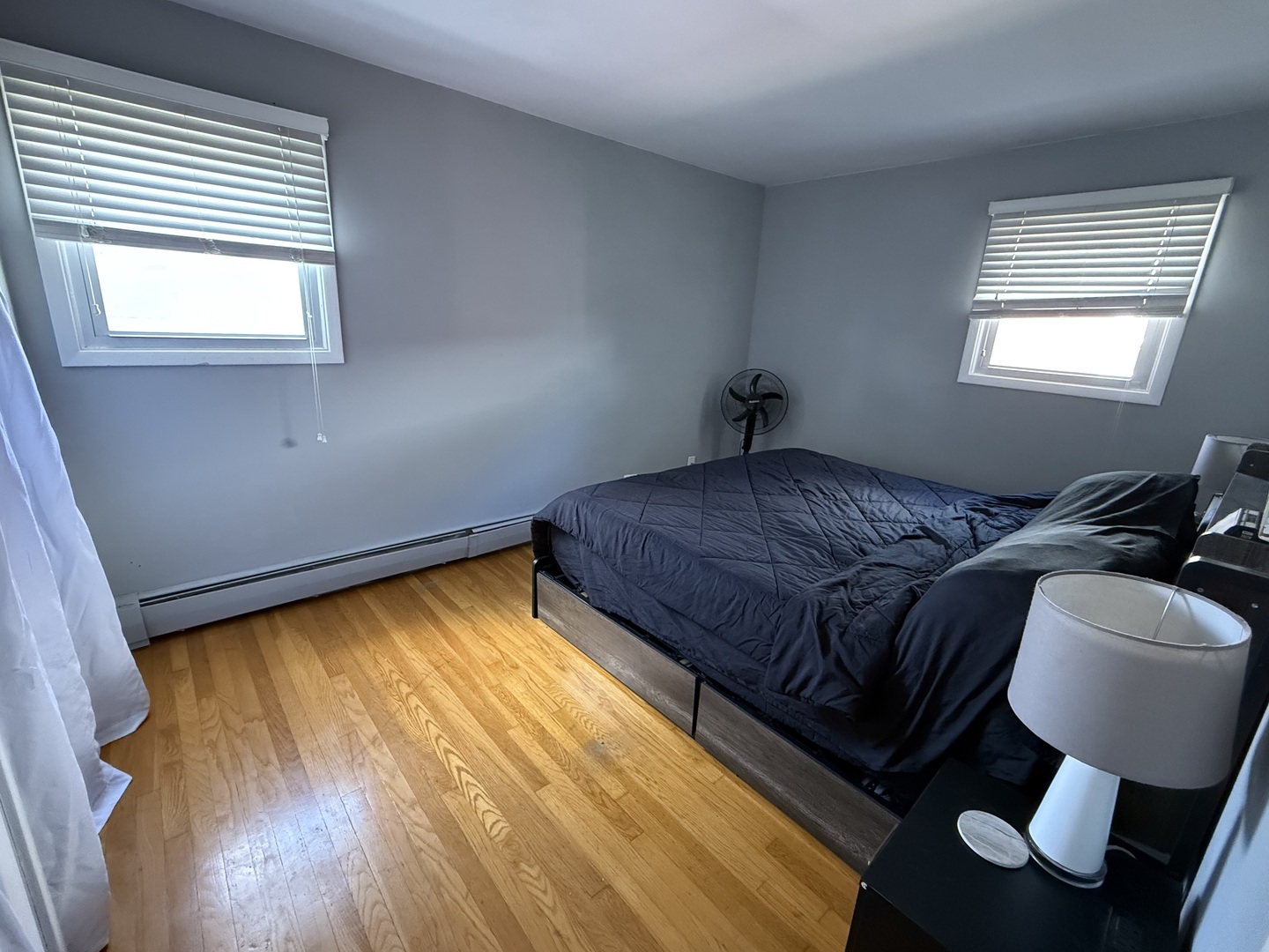 5653 Dover Road Oak Forest, IL 60452 - Photo 13 of 17 a bed sitting in a bedroom next to a window