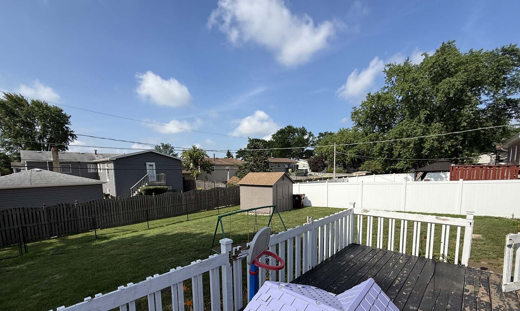 5653 Dover Road Oak Forest, IL 60452 - Photo 17 of 17 a view of a roof deck with couches and sky view