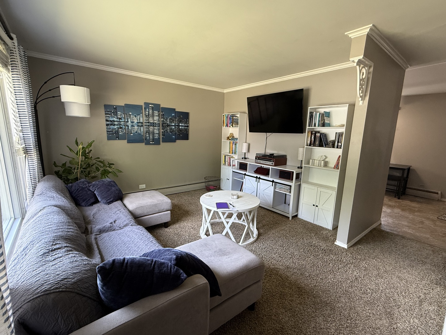 5653 Dover Road Oak Forest, IL 60452 - Photo 2 of 17 a living room with furniture and a flat screen tv