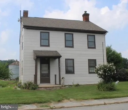 a front view of house with yard