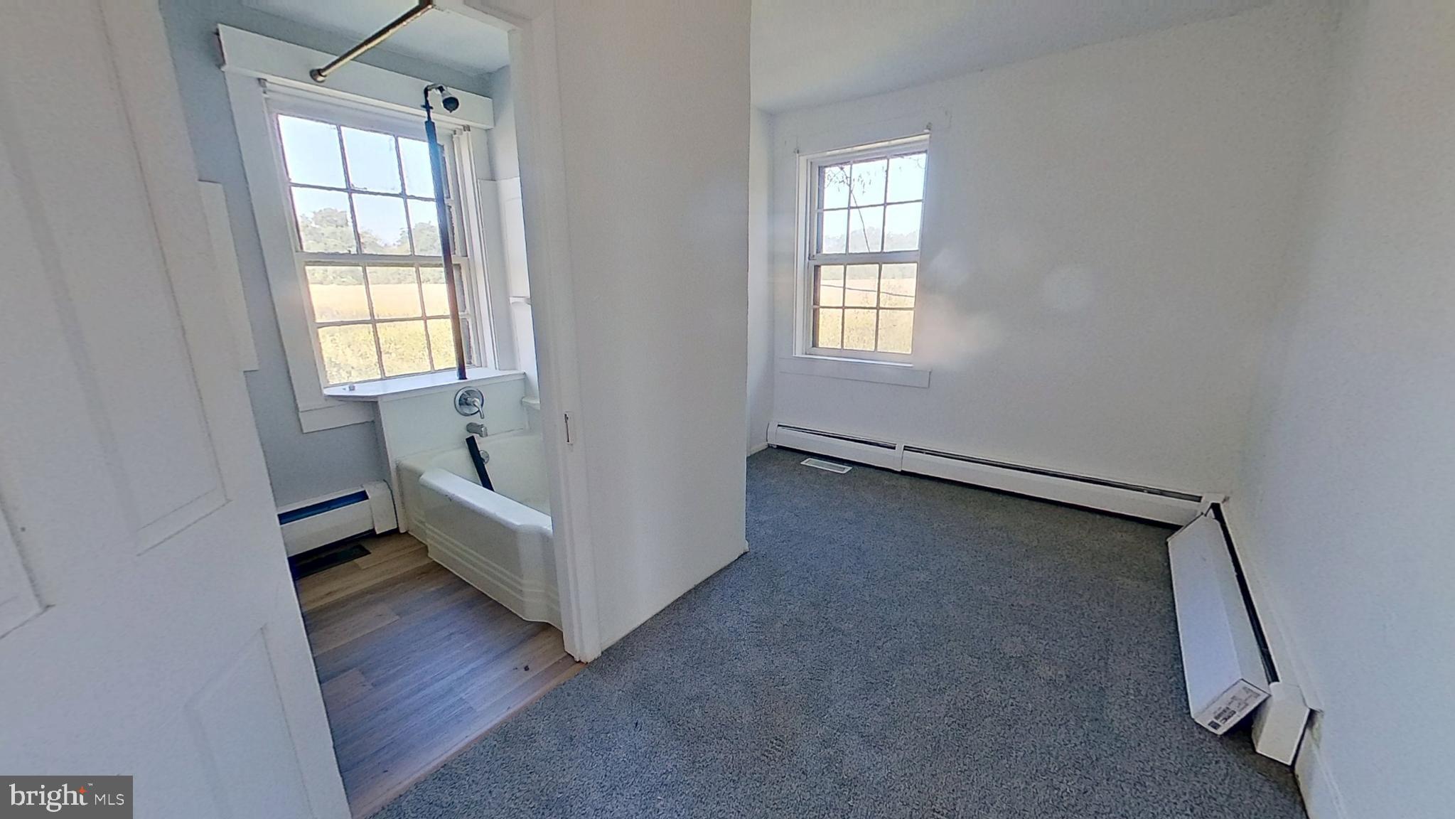 127 Nashville Boulevard Spring Grove, PA 17362 - Photo 16 of 16 a view of an empty room with wooden floor and a window