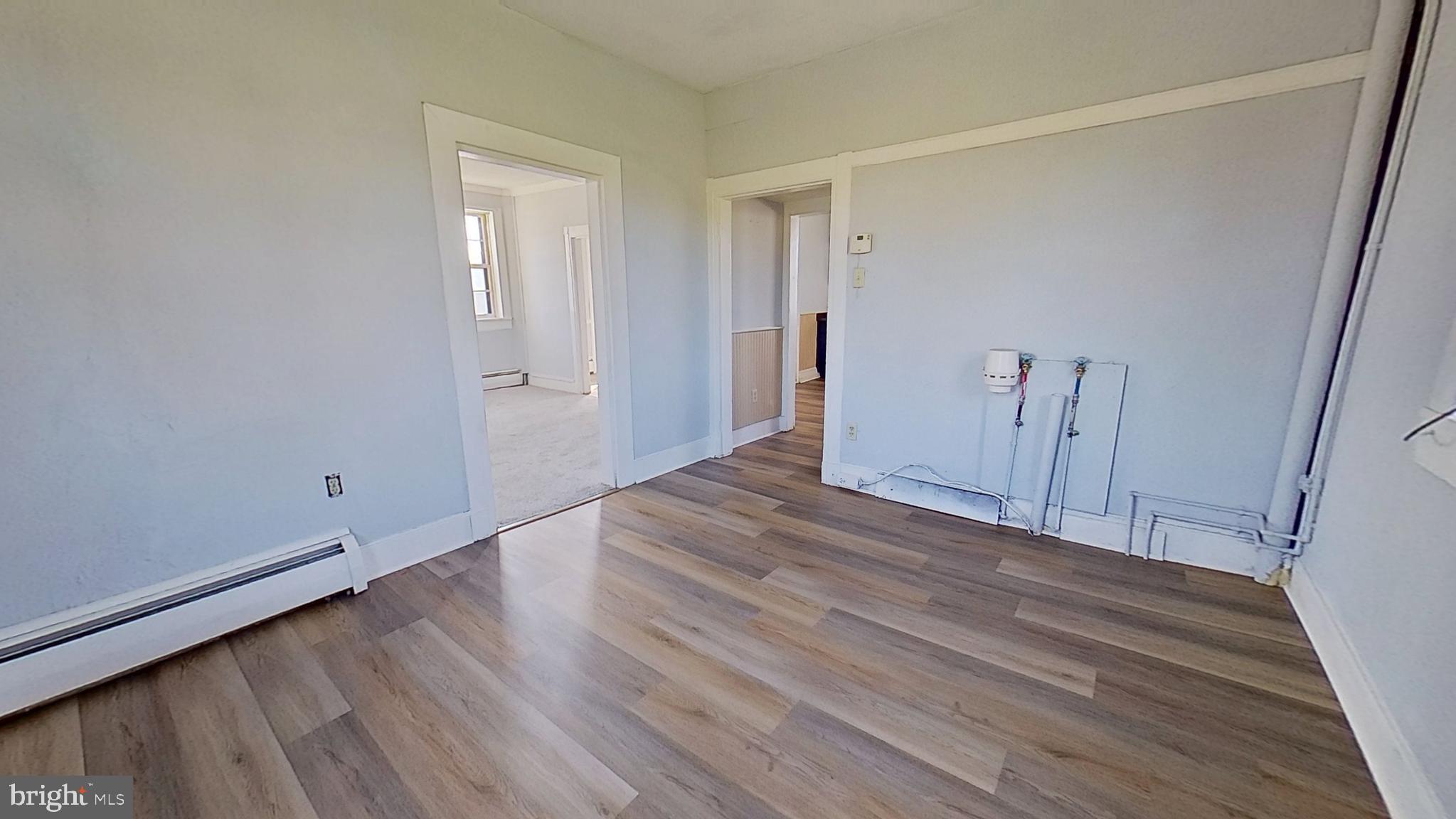 127 Nashville Boulevard Spring Grove, PA 17362 - Photo 6 of 16 a view of an empty room with wooden floor