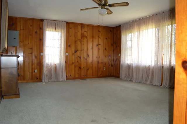 a kitchen that has a sink and a stove in it