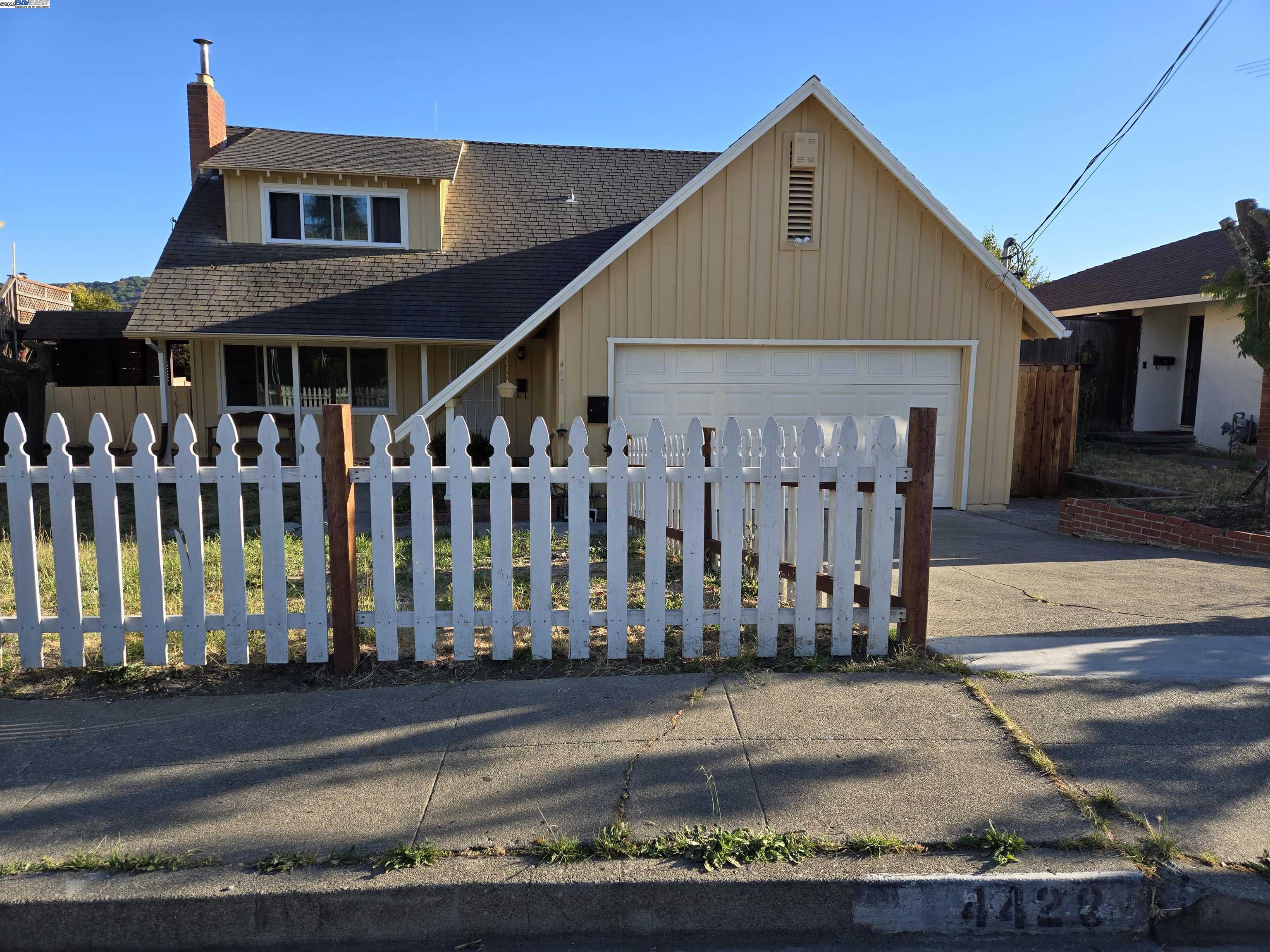 4428 Santa Rita Road Richmond, CA 94803 - Photo 1 of 1 a front view of a house with a yard