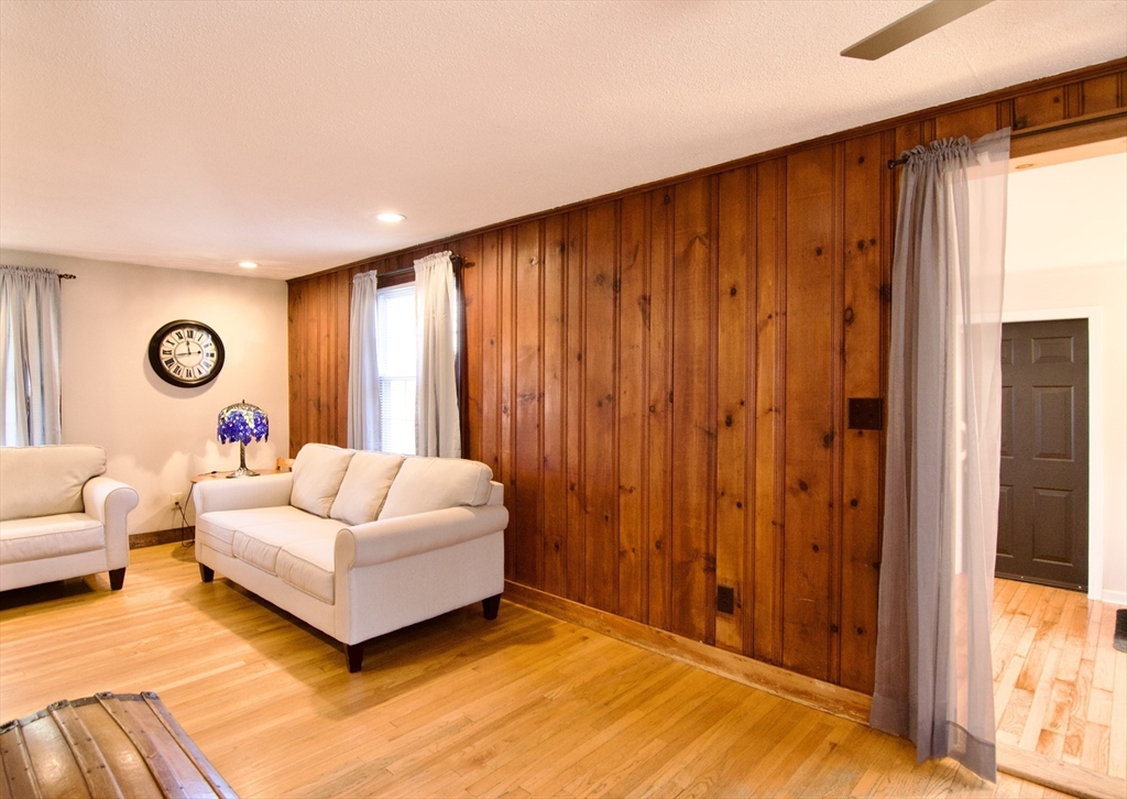 75 Wilton Street Springfield, MA 01109 - Photo 13 of 42 a spacious bedroom with a bed and a window