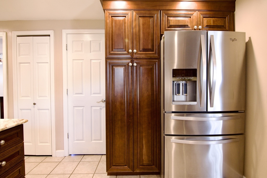 75 Wilton Street Springfield, MA 01109 - Photo 19 of 42 a view of kitchen with furniture and refrigerator