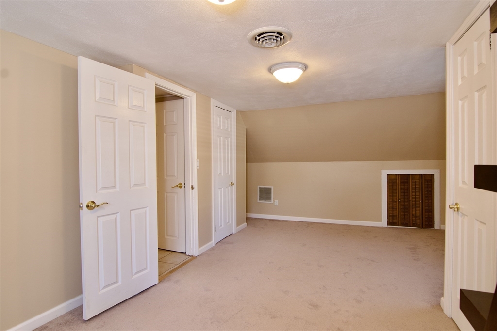 75 Wilton Street Springfield, MA 01109 - Photo 37 of 42 an empty room with windows