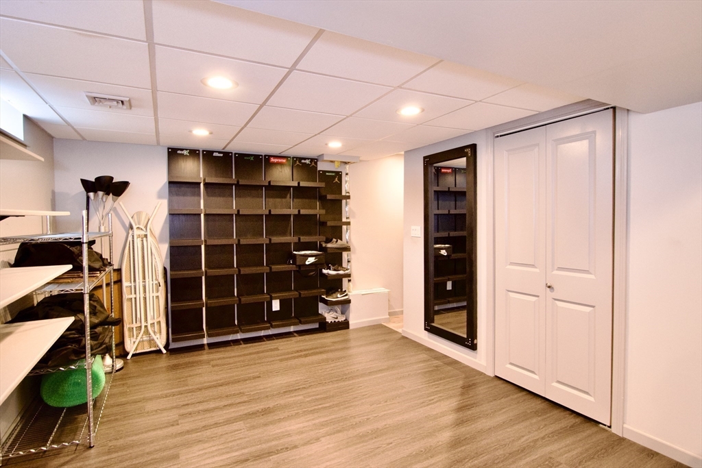 75 Wilton Street Springfield, MA 01109 - Photo 42 of 42 an empty room with wooden floor and closet