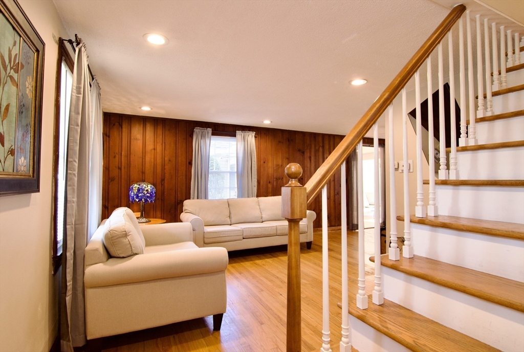 75 Wilton Street Springfield, MA 01109 - Photo 8 of 42 a living room with furniture and a large window