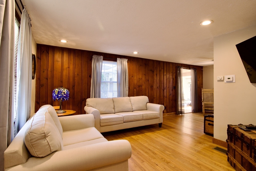 75 Wilton Street Springfield, MA 01109 - Photo 9 of 42 a living room with furniture and a large window