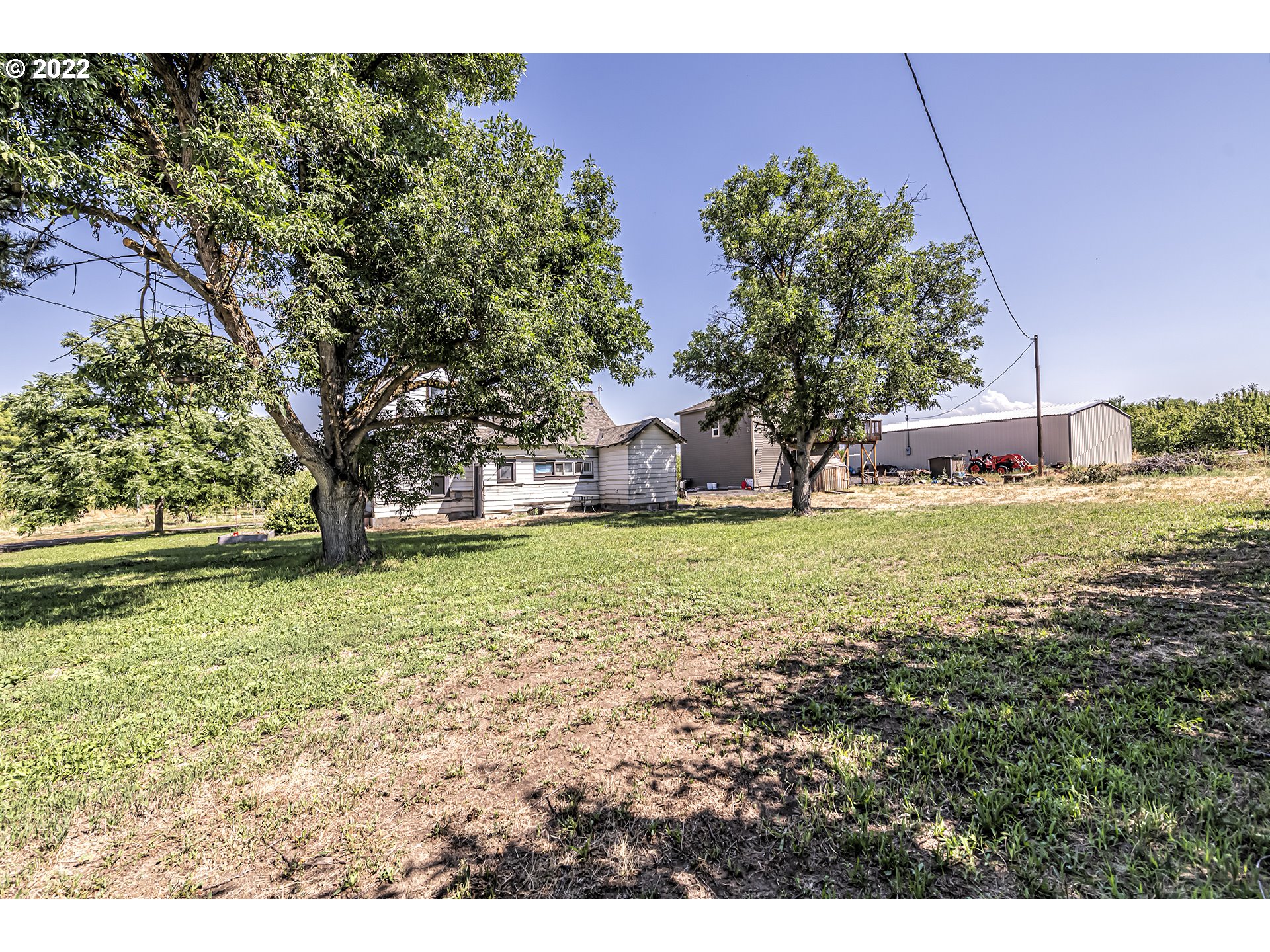 53486 Ruby Lane Milton Freewater, OR 97862 - Photo 19 of 27 a view of a yard with a house