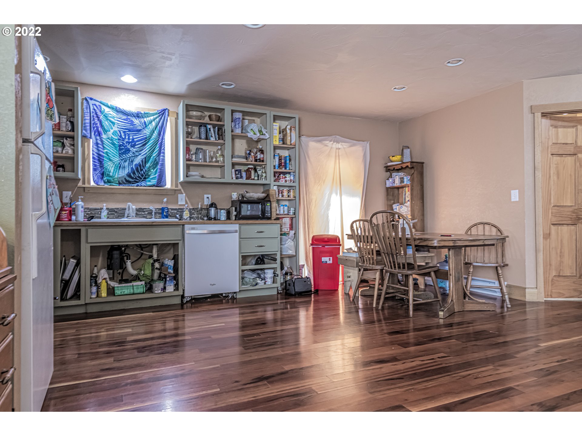 53486 Ruby Lane Milton Freewater, OR 97862 - Photo 23 of 27 a dining room with furniture and wooden floor