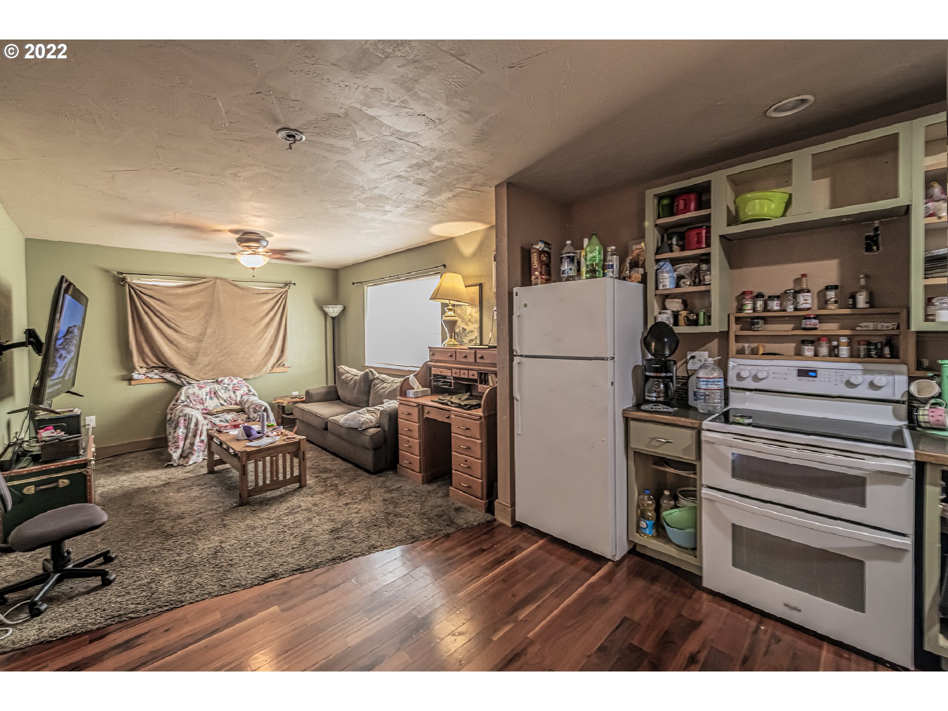53486 Ruby Lane Milton Freewater, OR 97862 - Photo 24 of 27 a kitchen with refrigerator and cabinets