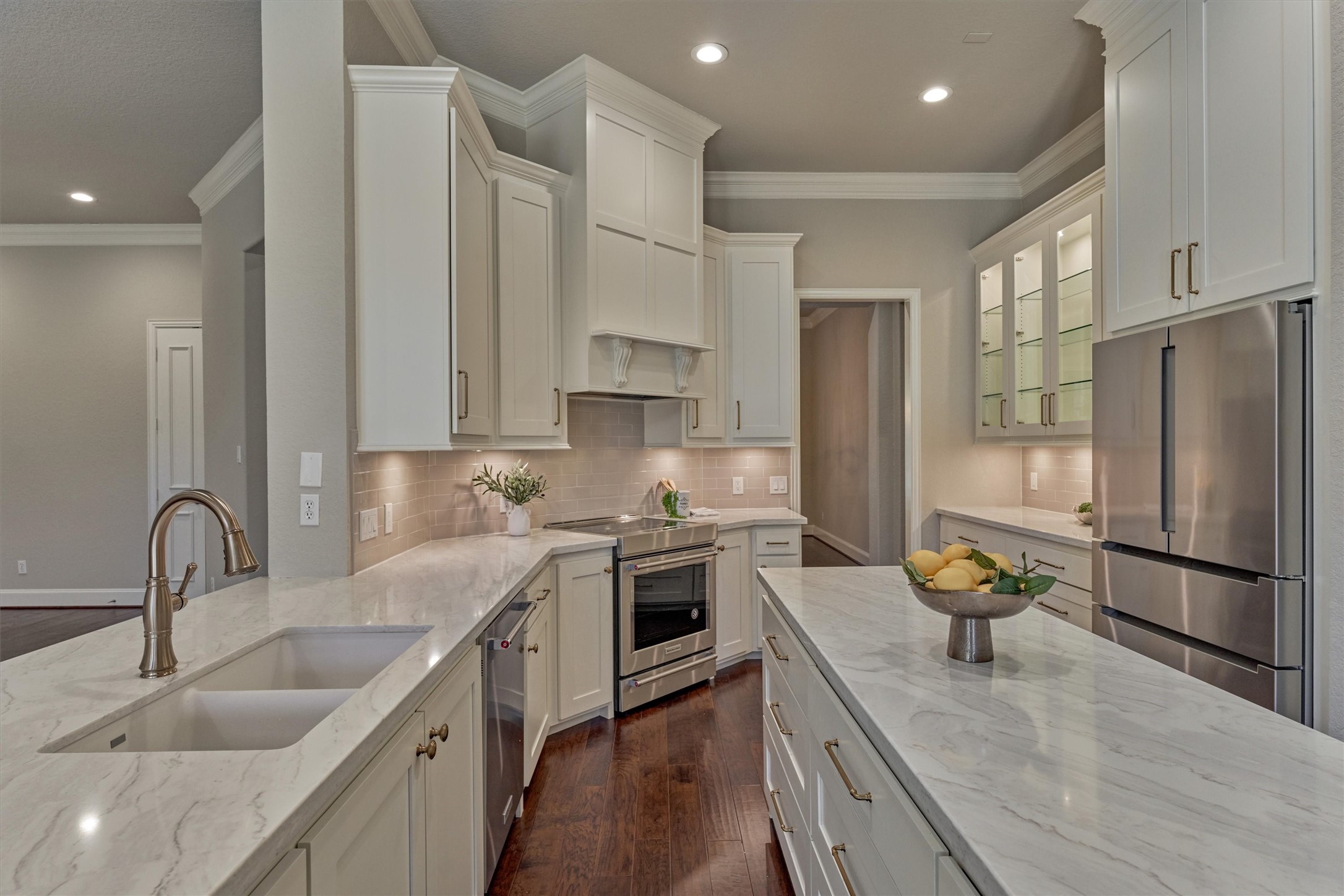 91 West Racing Cloud Court The Woodlands, TX 77381 - Photo 13 of 47 Showcasing updated quartz countertops and an abundance of cabinetry and counter space for prep.
