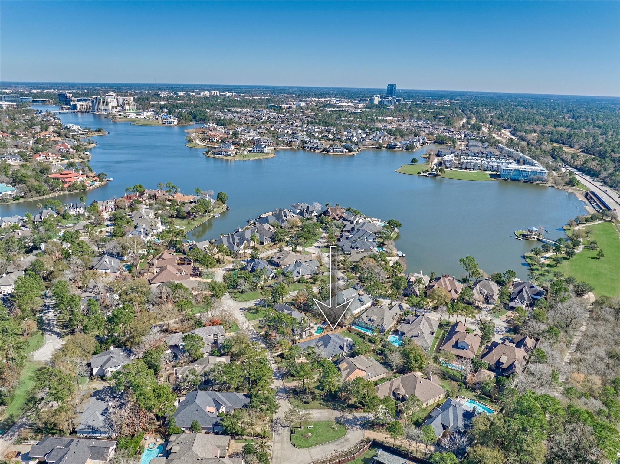 91 West Racing Cloud Court The Woodlands, TX 77381 - Photo 2 of 47 Just a stone’s throw from Lake Woodlands, this PRIME location is unbeatable!