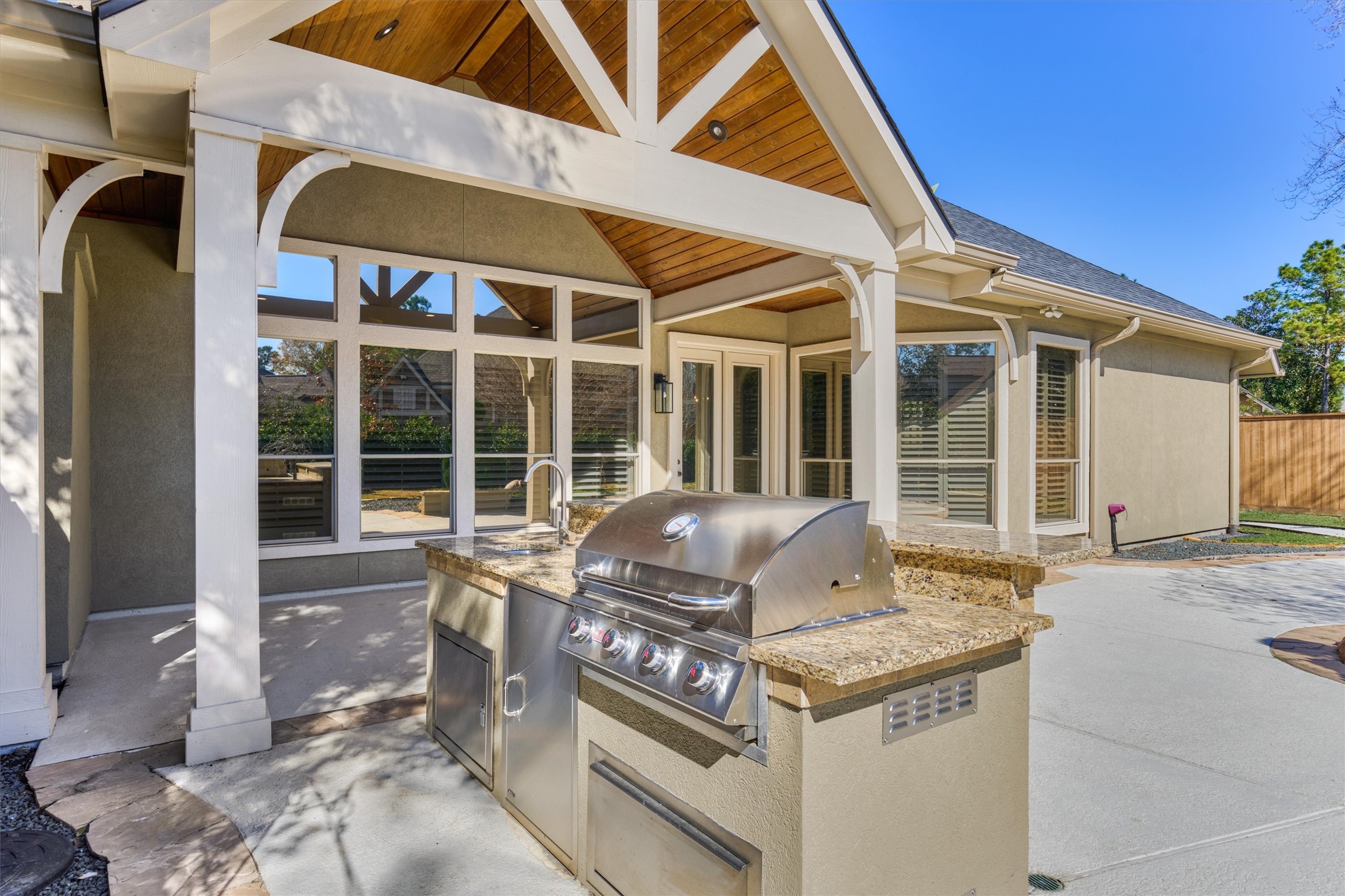 91 West Racing Cloud Court The Woodlands, TX 77381 - Photo 34 of 47 Improved outdoor living area with summer kitchen is sure to bring year-round enjoyment.