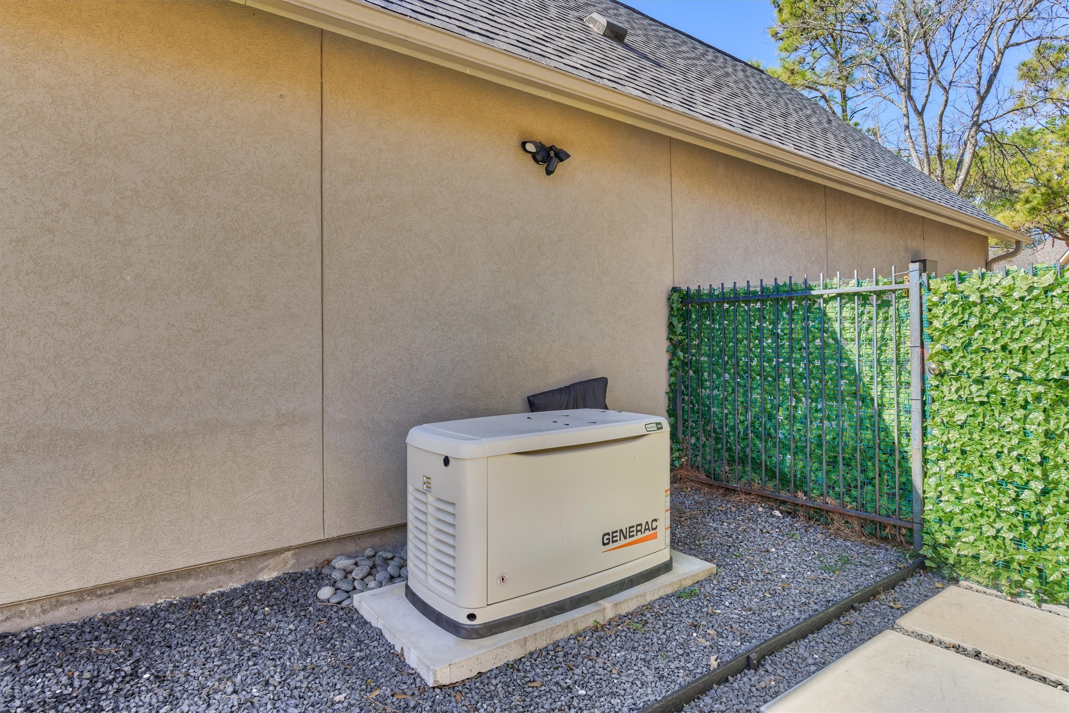91 West Racing Cloud Court The Woodlands, TX 77381 - Photo 4 of 47 Whole-home Generac generator for added peace of mind.