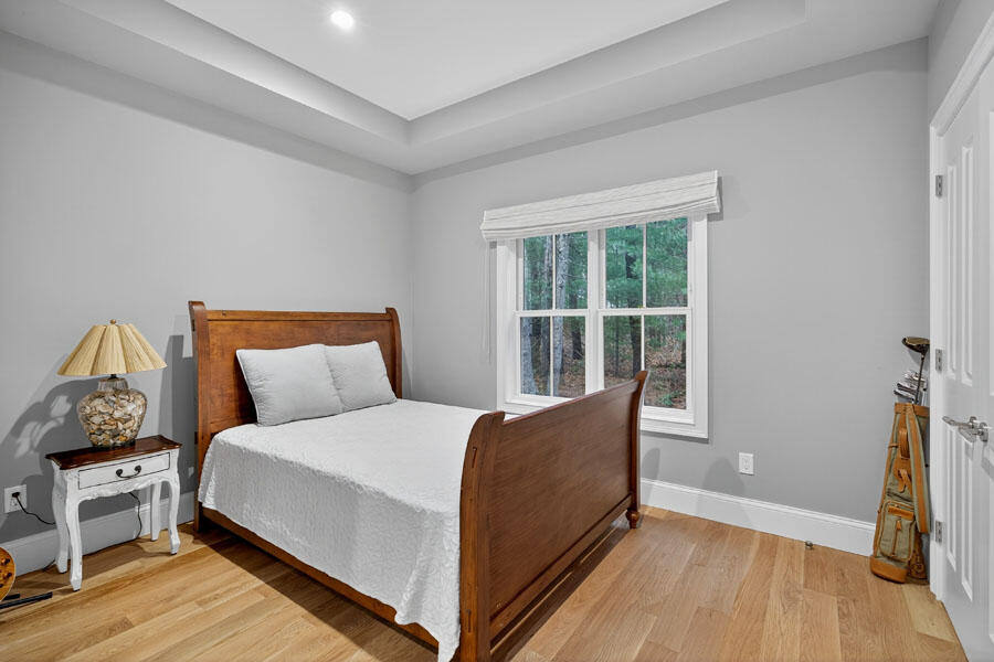 280 Ice Valley Road Osterville, MA 02655 - Photo 30 of 45 a bedroom with a bed and a window