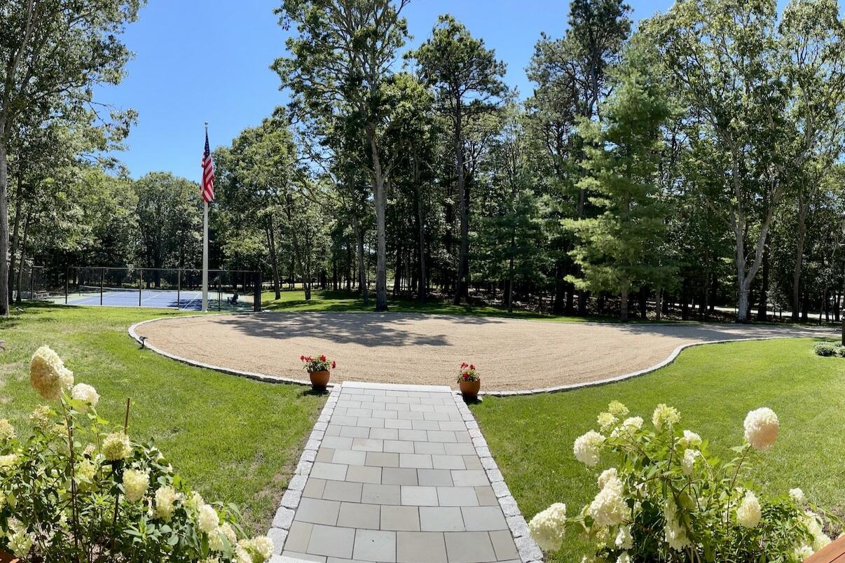 280 Ice Valley Road Osterville, MA 02655 - Photo 44 of 45 a view of a swimming pool with an outdoor space