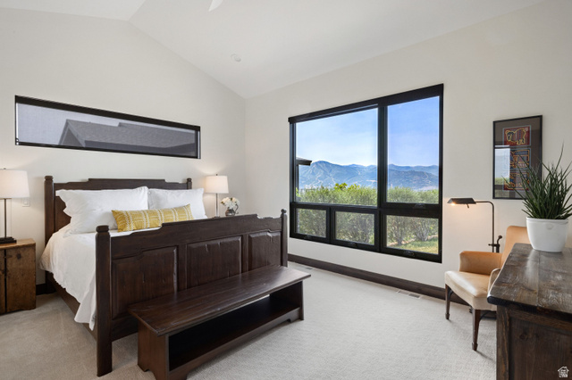 11547 Soaring Hawk Lane Hideout, UT 84036 - Photo 15 of 43 Spacious interior featuring a vaulted ceiling and a large picture window