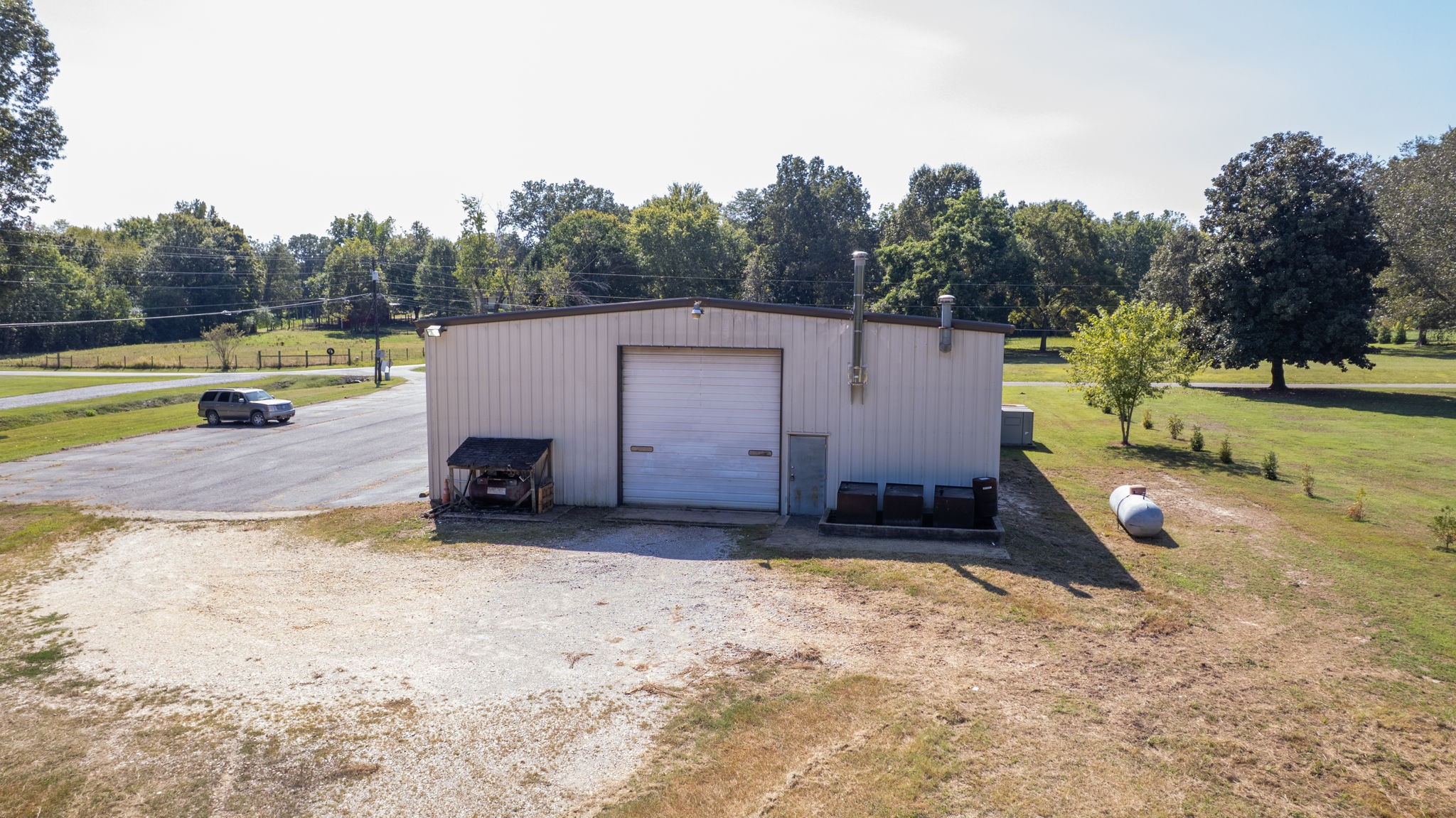 200 Tom Smith Road Martin, TN 38237 - Photo 44 of 51 a view of a backyard with swimming pool and sitting area