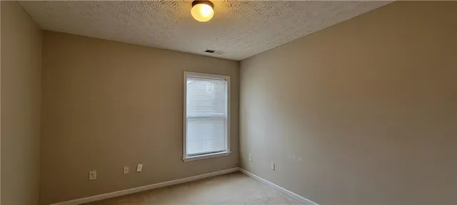 an empty room with window