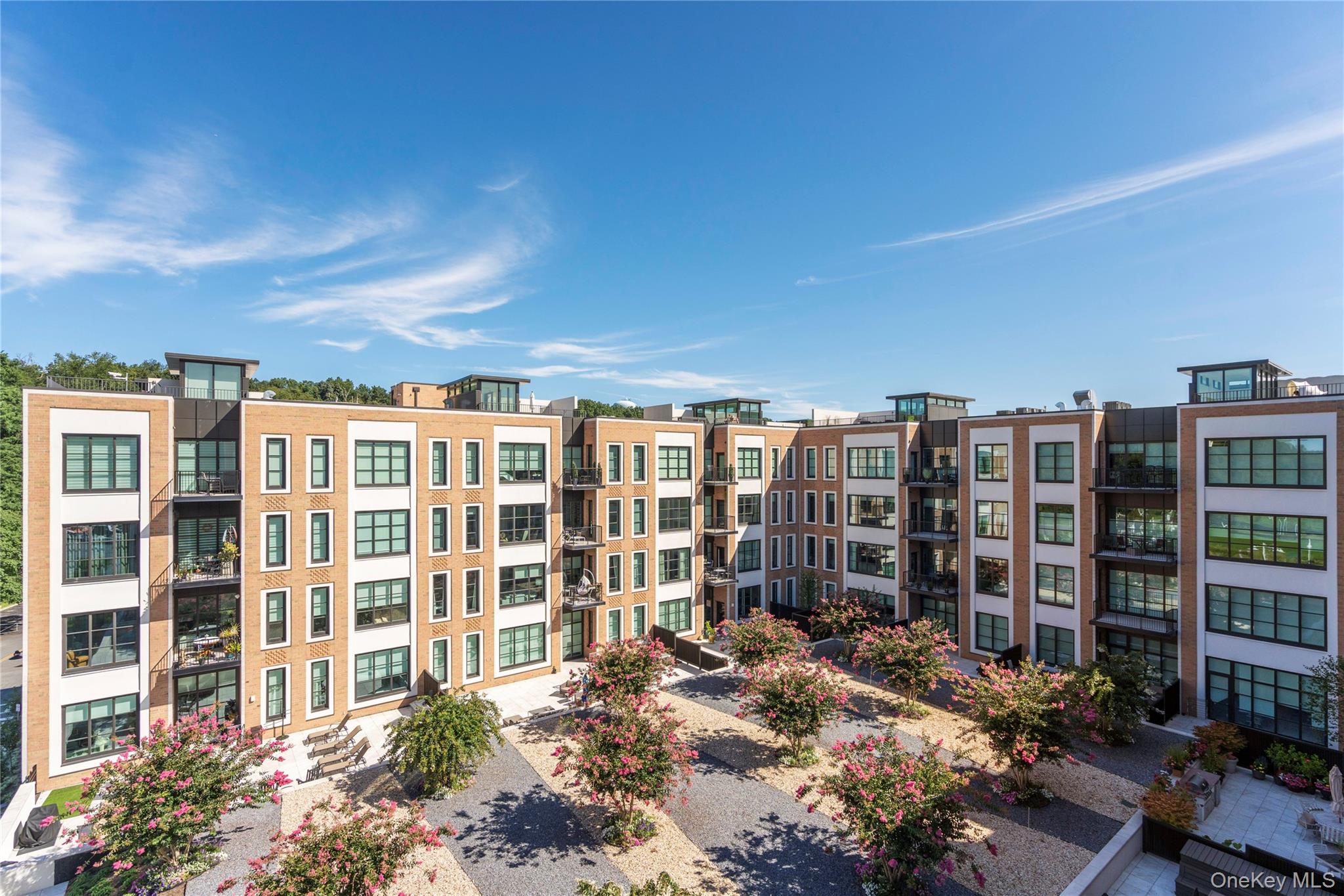 100 Garvies Point Road, Unit 1309 Glen Cove, NY 11542 - Photo 17 of 36 a front view of a building