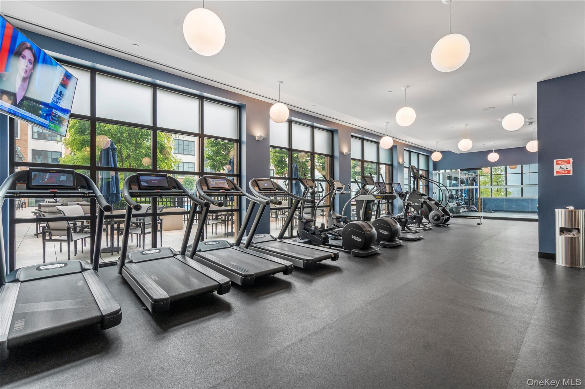 100 Garvies Point Road, Unit 1309 Glen Cove, NY 11542 - Photo 31 of 36 a view of a room with gym equipment