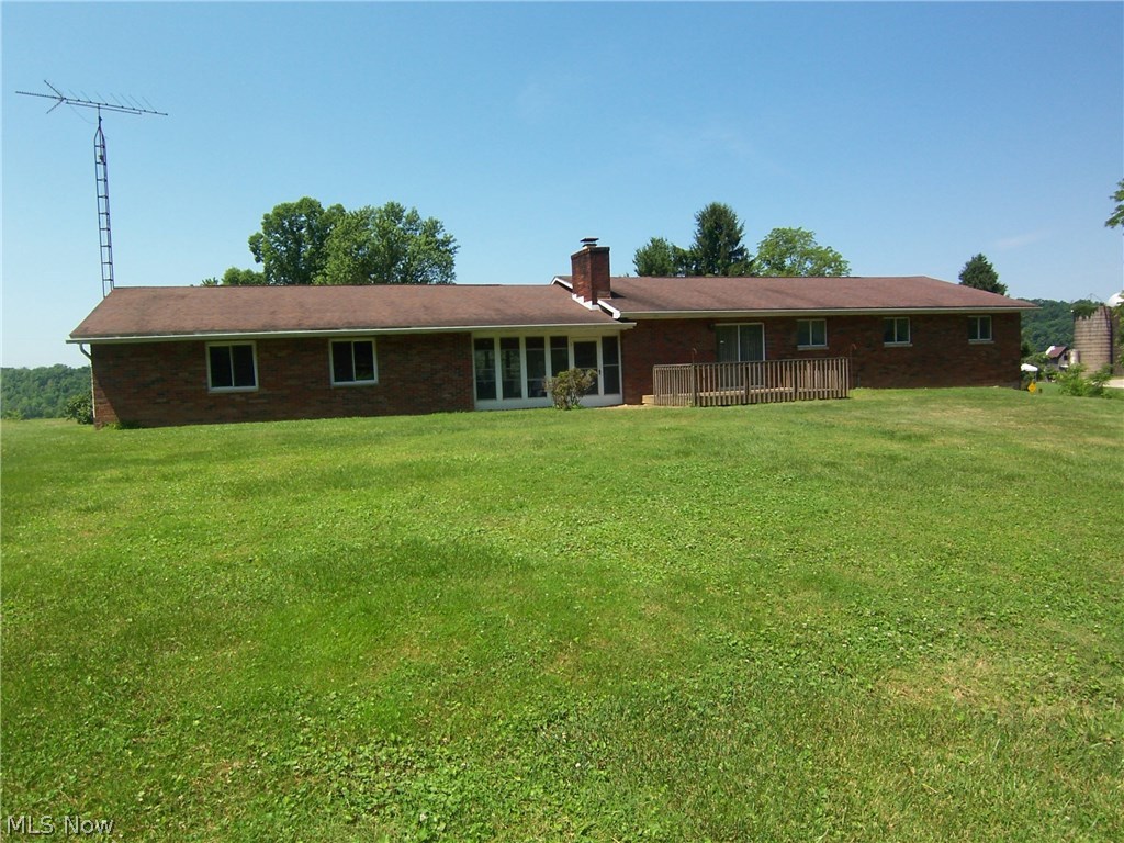 2560 Robinhood Road Washington, WV 26181 - Photo 25 of 35 Back view of the house. Huge yard.