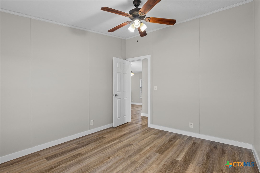 183 Altamira Avenue Elgin, TX 78621 - Photo 24 of 37 wooden floor in an empty room