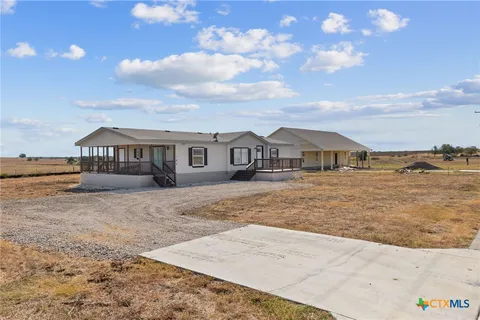 a front view of a house with street