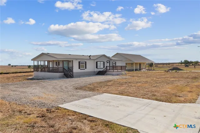 a front view of a house with street