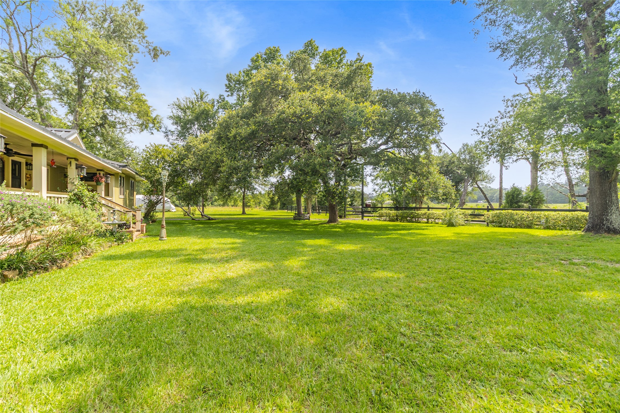 17821 Brown Road Conroe, TX 77306 - Photo 2 of 50 a view of a house with a big yard