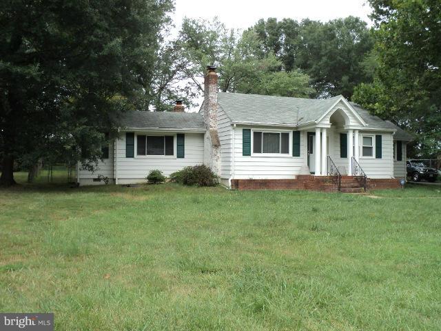 6702 Springbrook Lane Clinton, MD 20735 - Photo 2 of 30 a front view of house with yard and green space