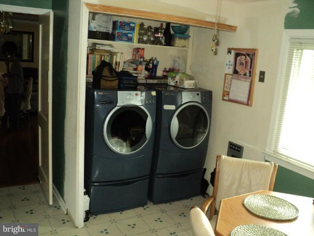 6702 Springbrook Lane Clinton, MD 20735 - Photo 23 of 30 a utility room with sink dryer and washer