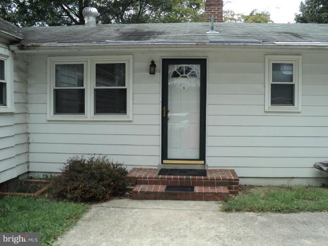 6702 Springbrook Lane Clinton, MD 20735 - Photo 28 of 30 a small house with a outdoor space