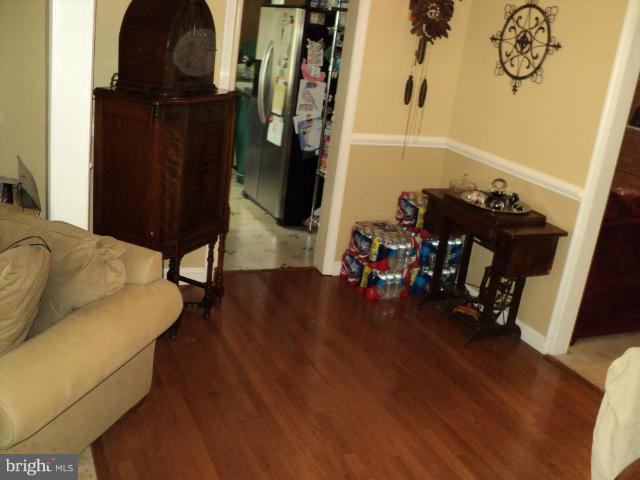6702 Springbrook Lane Clinton, MD 20735 - Photo 10 of 30 a living room with furniture and wooden floor